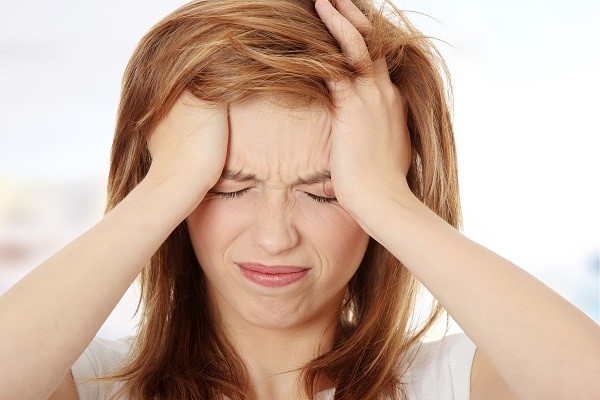 Triệu chứng răng miệng liên quan đến chu kì kinh nguyệt phụ nữ